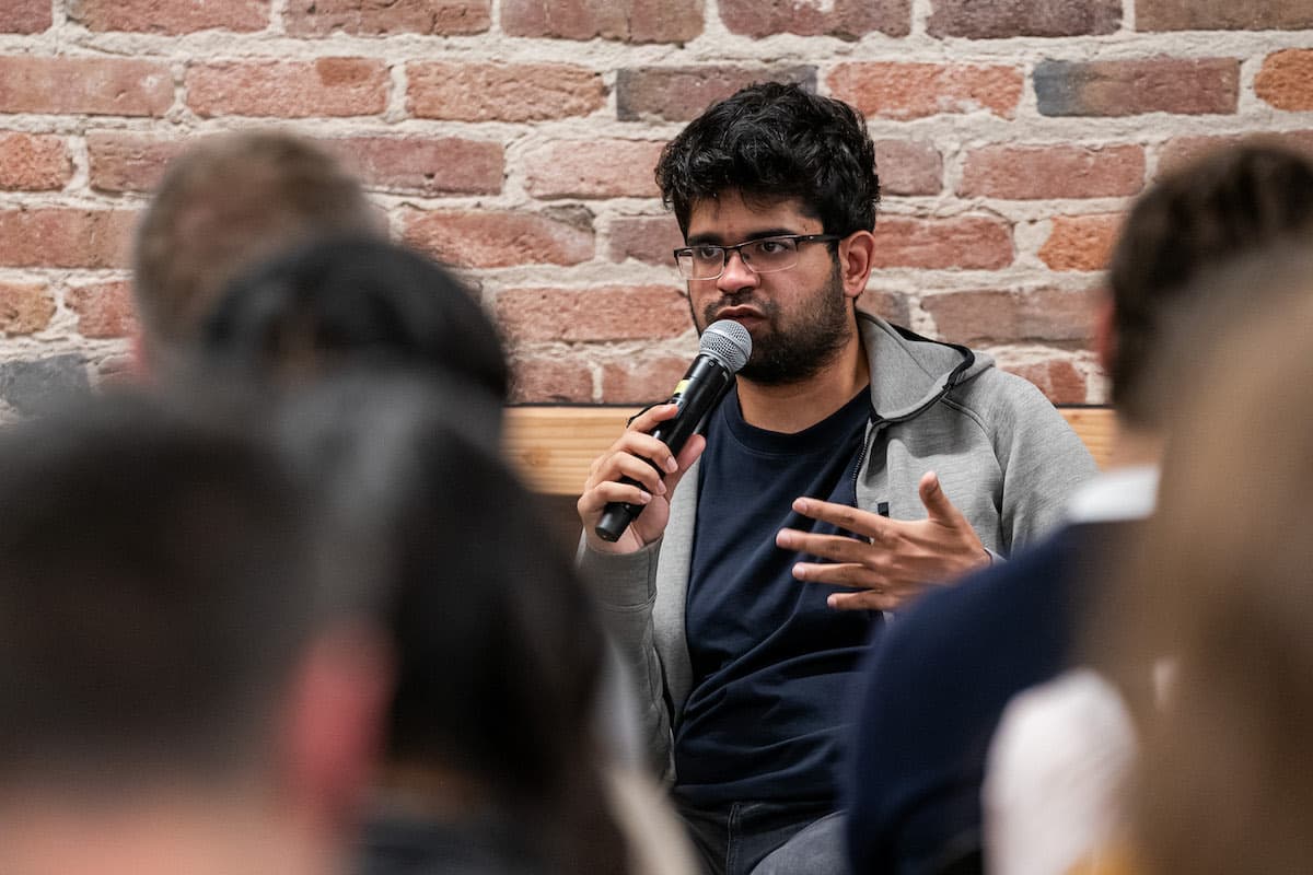 Aravind Srinivas on stage at Thursday Nights in AI