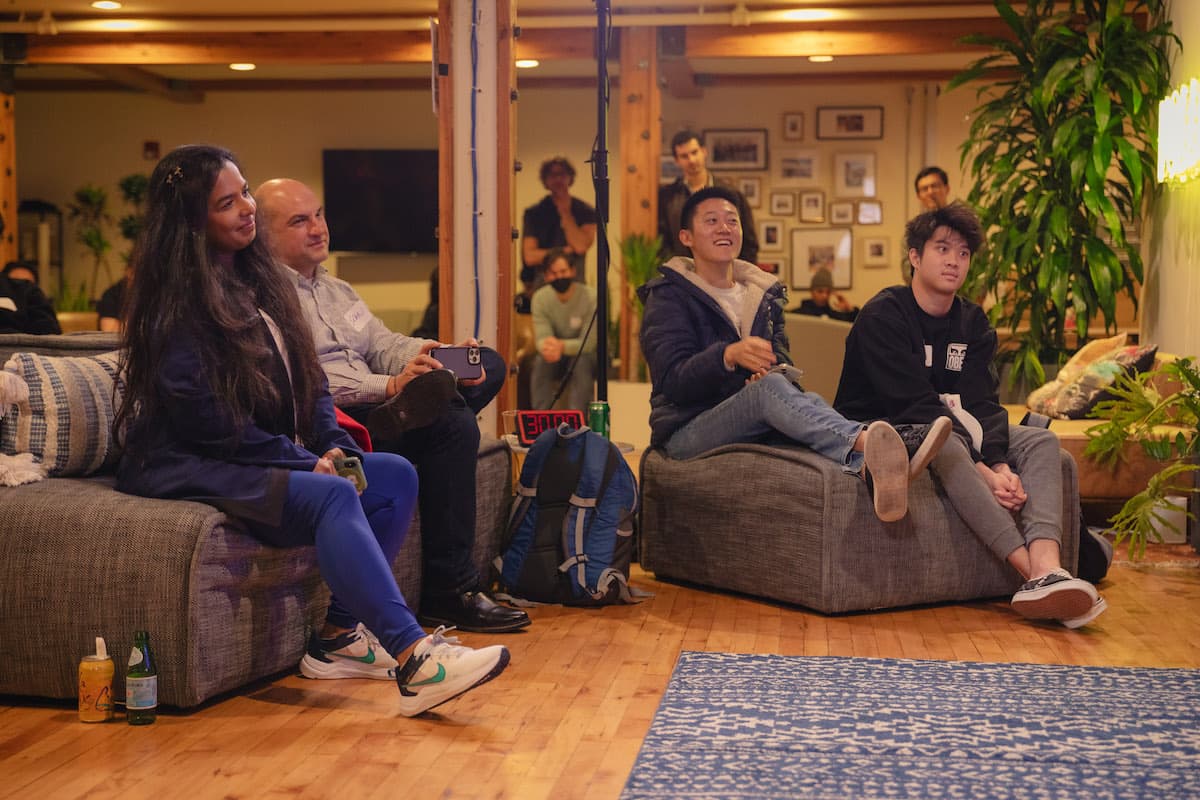 Guests talking before a Thursday Nights in AI fireside chat